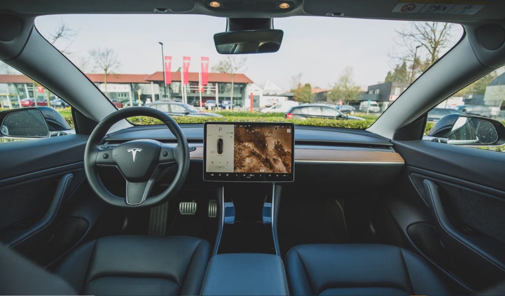 How do software updates work on Tesla cars?